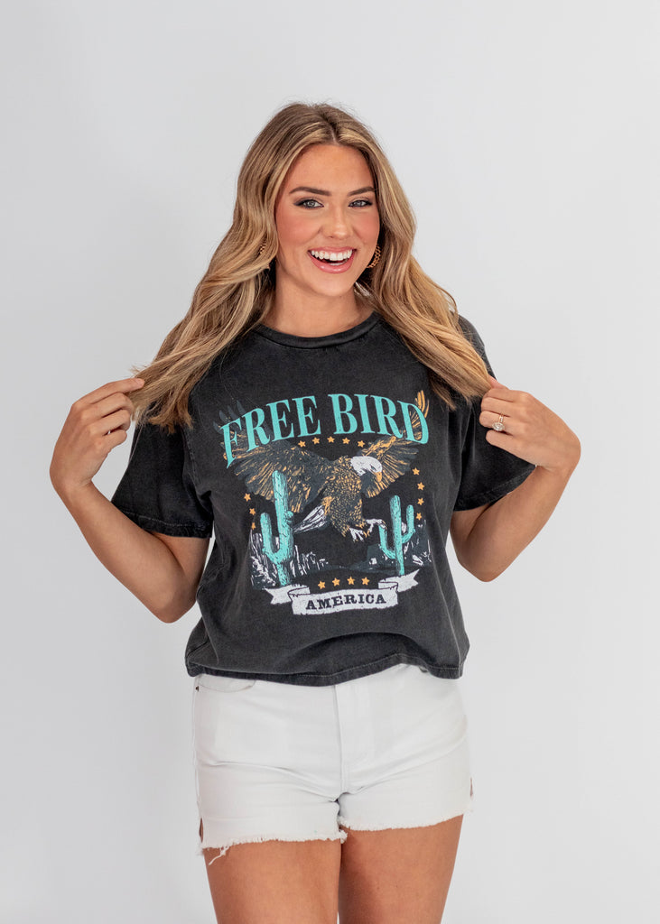 washed black tee with blue "Free Bird America" print