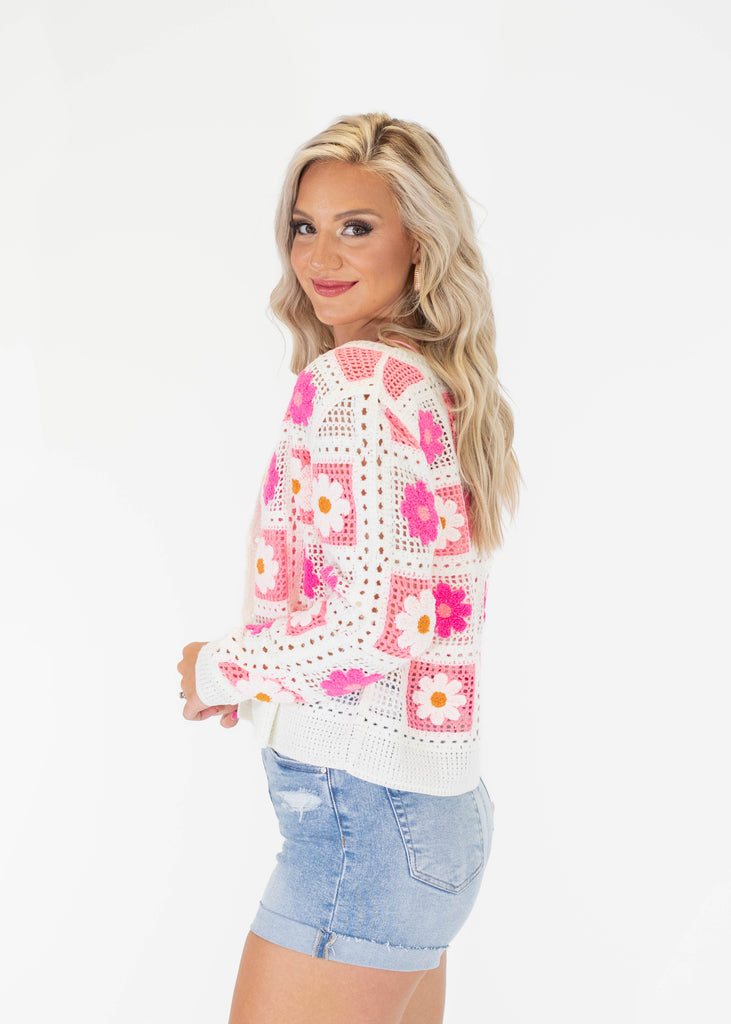 pink and white crochet flower cardigan