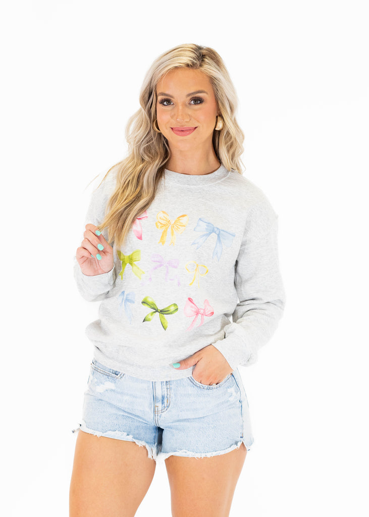 grey crewneck with colorful bows
