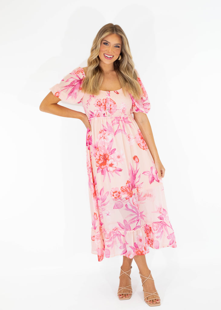 pink floral midi dress with puff sleeves, open back and smocked chest