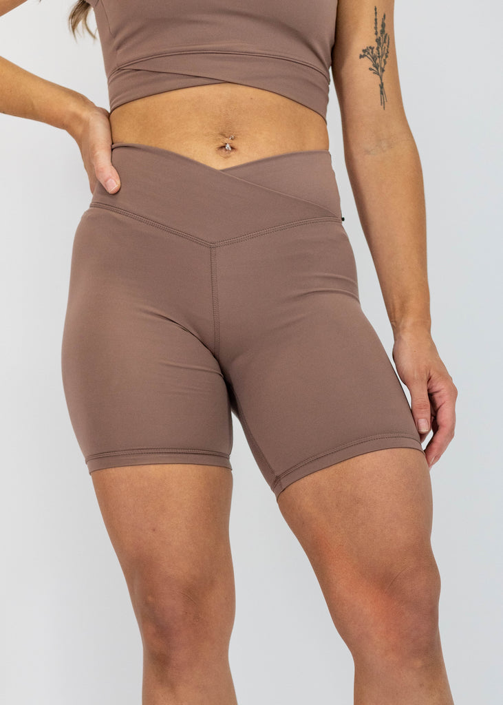 brown biker shorts with crossover waist