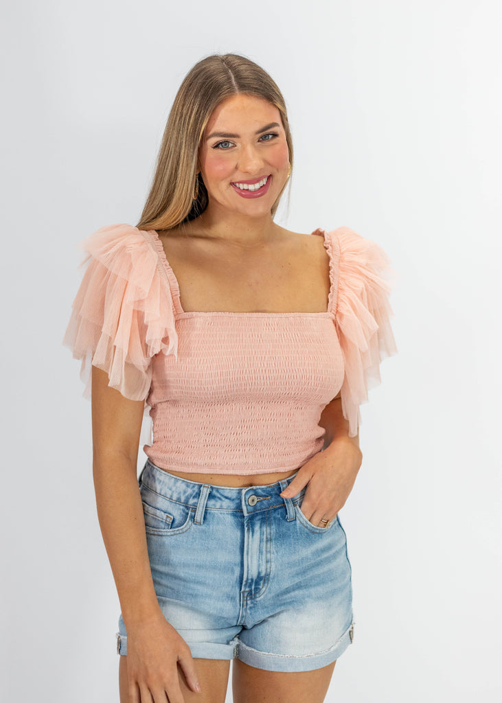 light pink tank with shirred bodice and ruffle sleeves