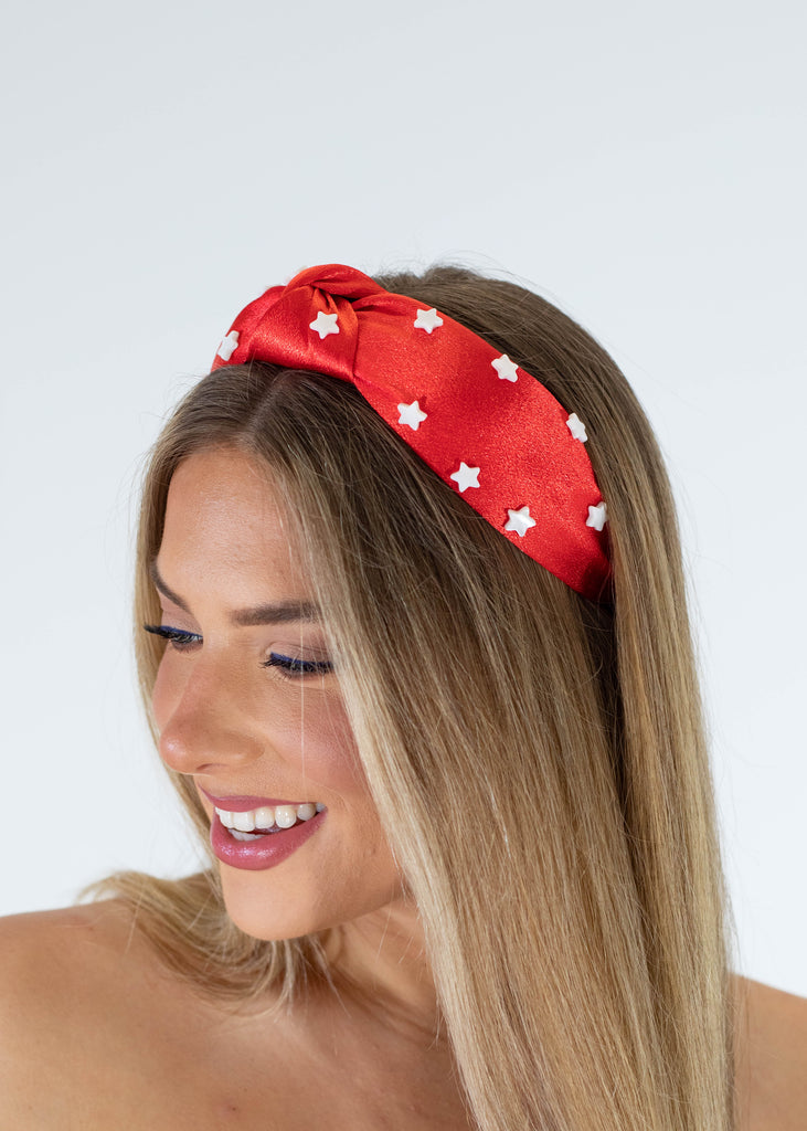 red satin headband with white stars