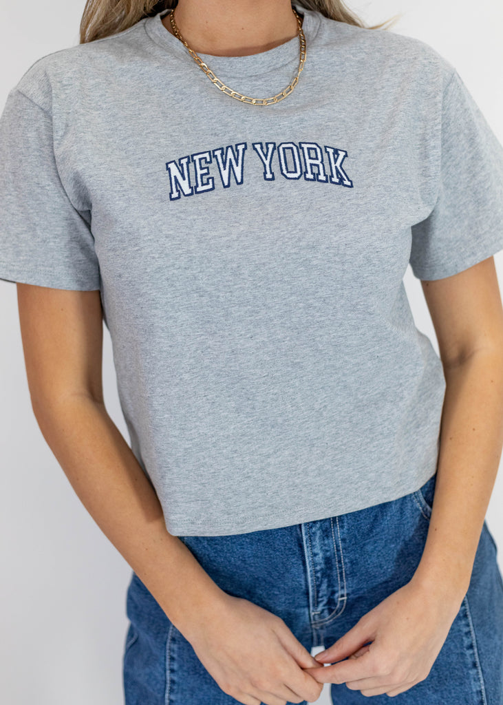 gray boxy-fit baby tee with "New York" lettering